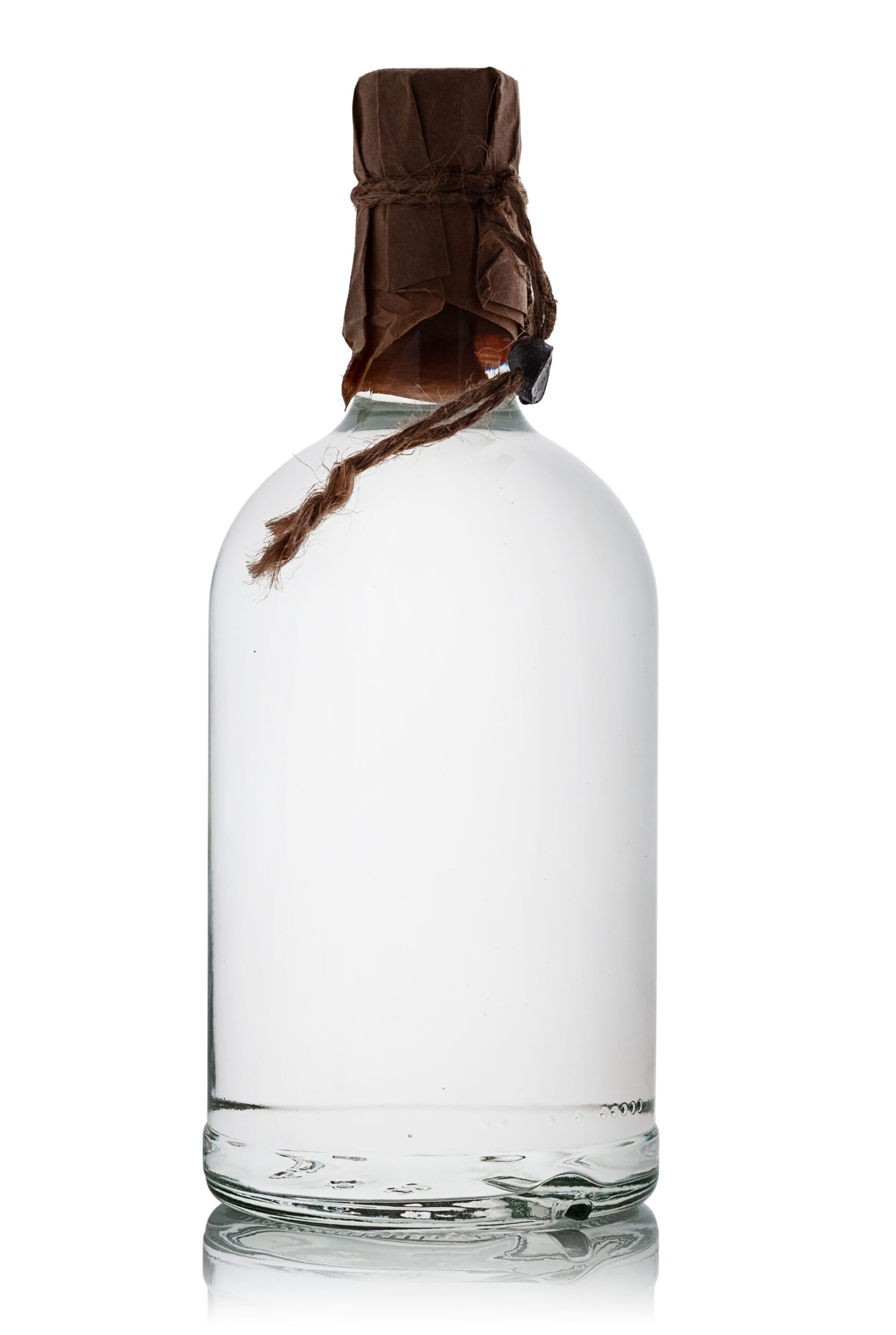 Full bottle of moonshine on white background